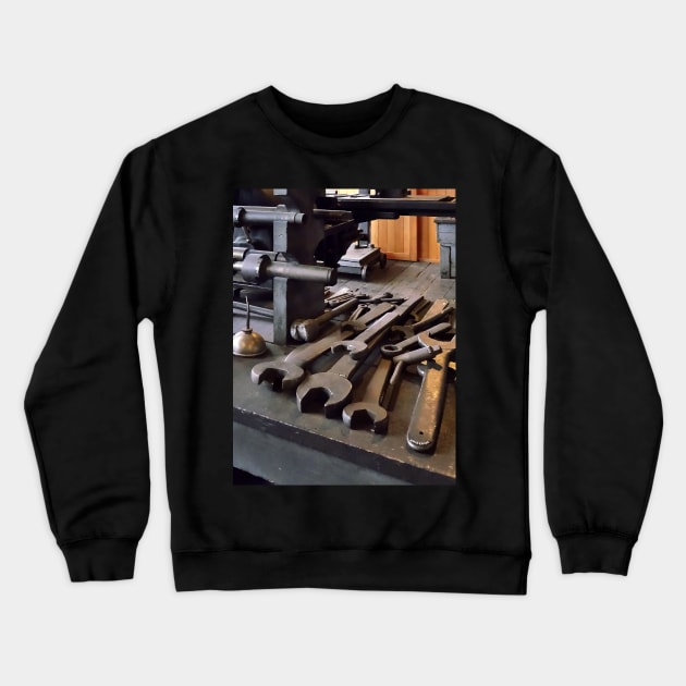 Wrenches and Oil Can in Machine Shop Crewneck Sweatshirt by SusanSavad